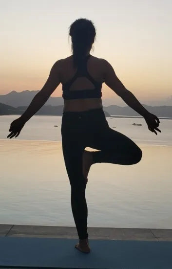 Tracy Sun doing yoga exercise | Tracy Bio Profile Picture
